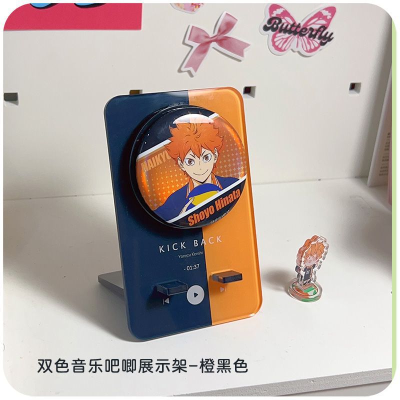 Two-tone music badge display stand - orange and black