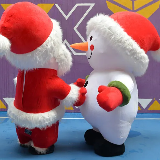 Mascota caliente Santa muñeco de nieve disfraz inflable adulto soplar piel felpa mascota Sui inflado disfraz de Navidad para eventos fiesta