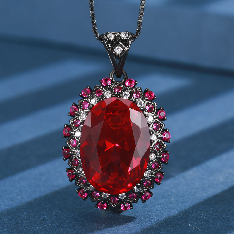 Black Gold red corundum pendant with box chain
