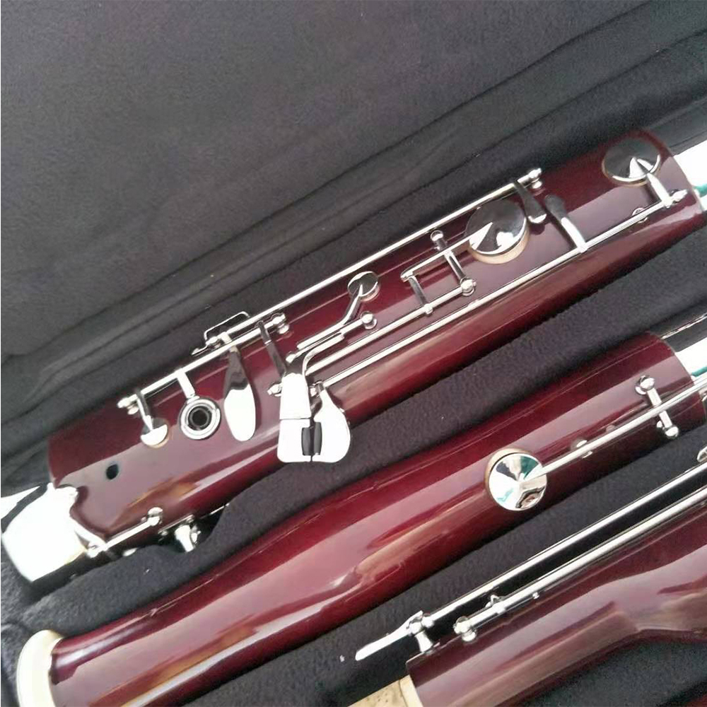 Rouge foncé, bois d'érable, touches nickelées