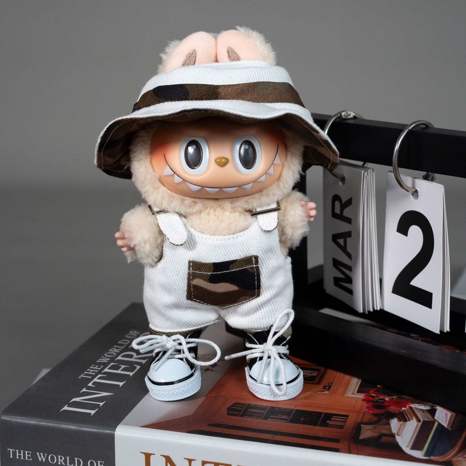 White camouflage suit + black canvas shoes