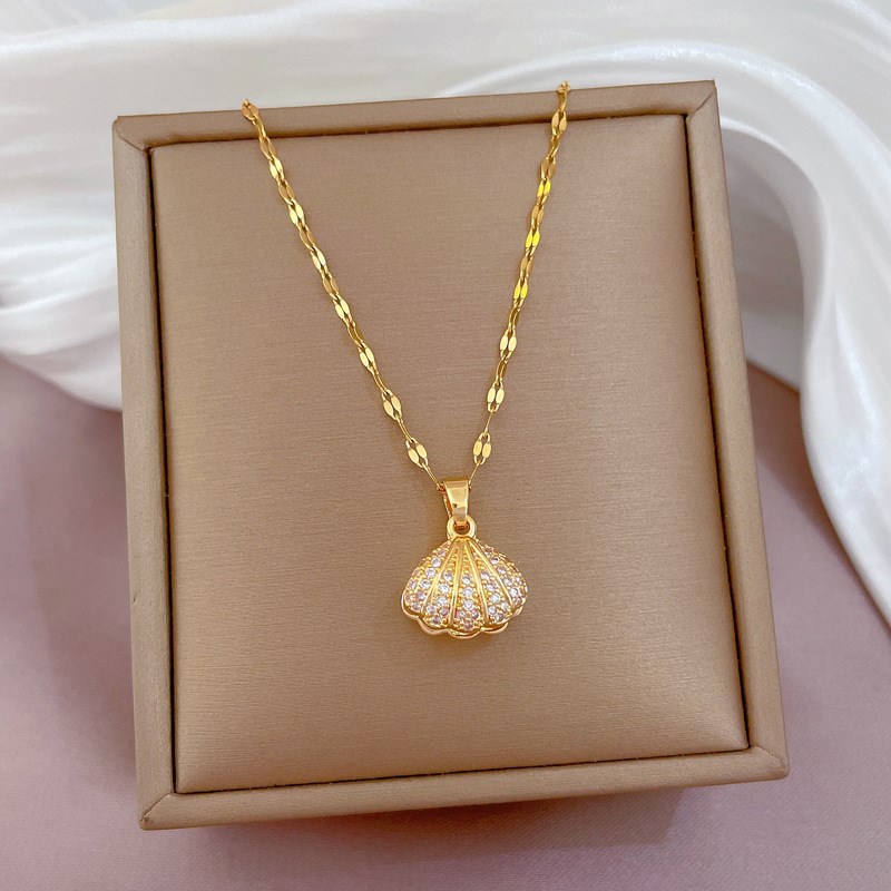 X006 Collar Concha Perla Oro