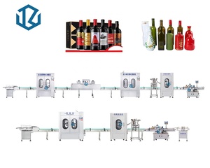 Linea di tappatura di riempimento della macchina della bottiglia di vetro di bordeaux del whisky della vodka del rum del gin completamente automatica linea di produzione dell'imbottigliamento del vino dell'uva