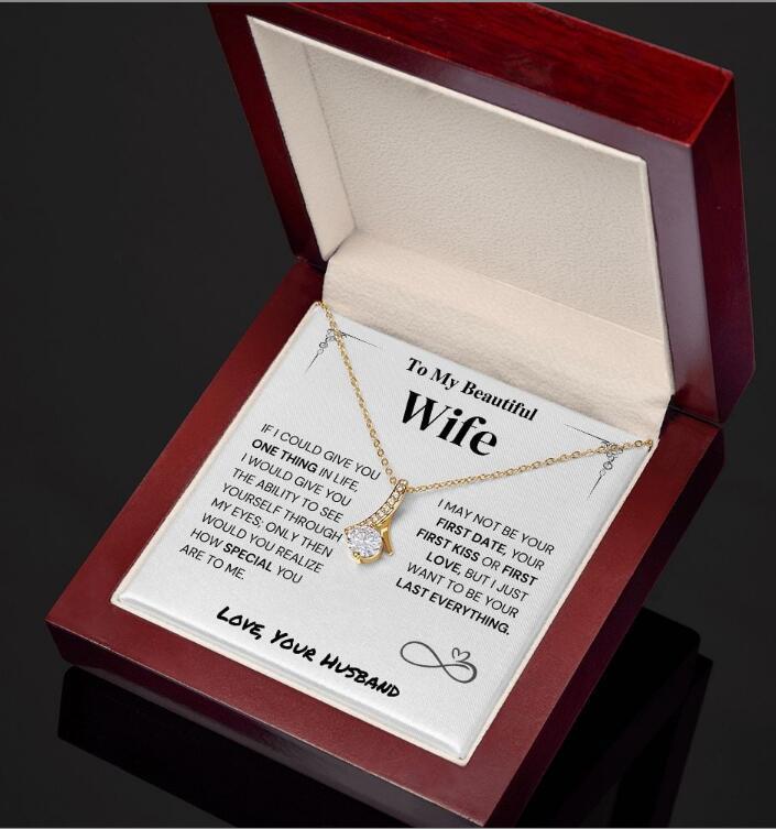 Oro + carta + scatola di legno
