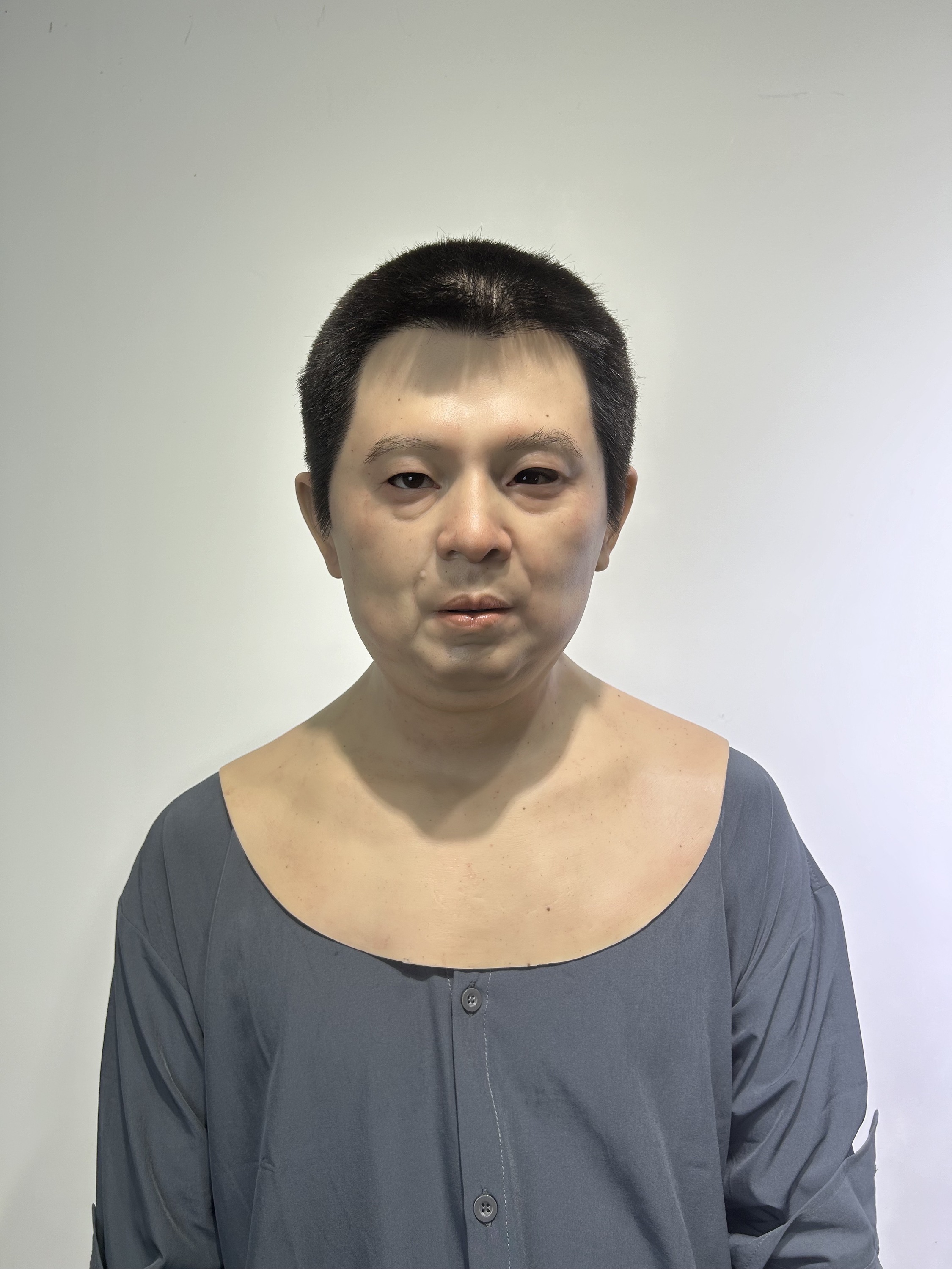 Qiang Zhao, avec des cheveux