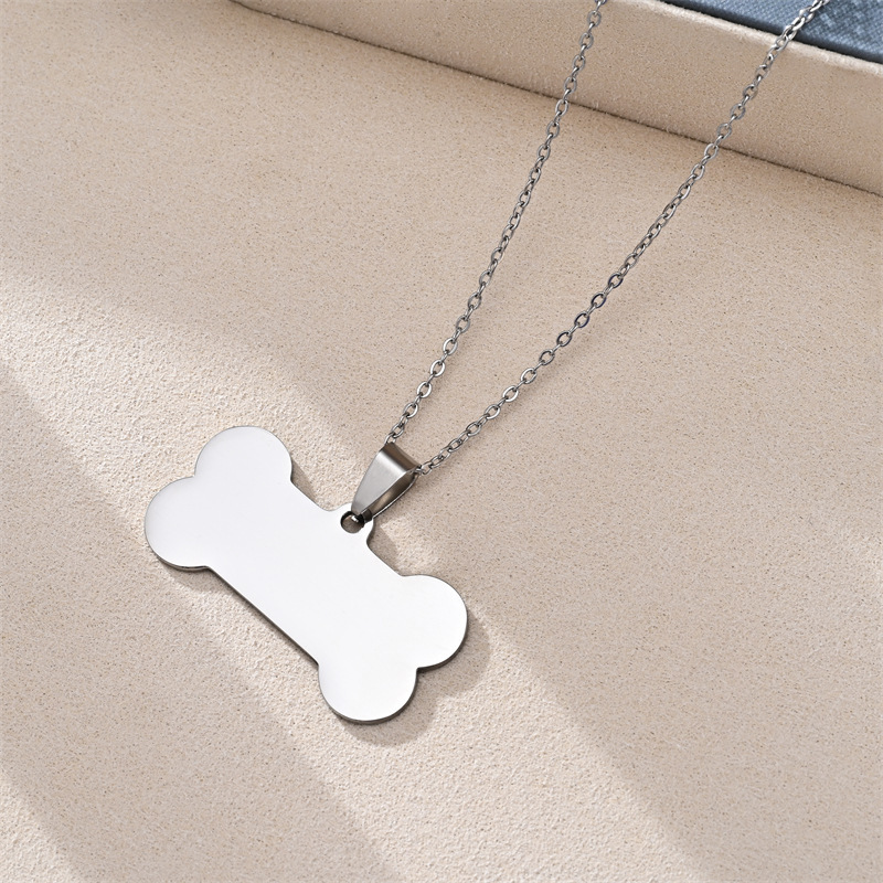 Pendentif chaîne 04X50, os de chien 2.0X3.9mm, couleur acier.