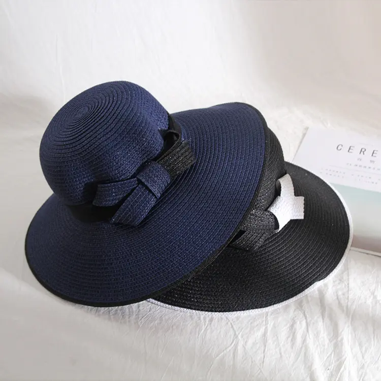 HZM-23248 nuovo commercio all'ingrosso elegante cappello a secchiello naturale rafia paglia treccia floscia cappello fiocchi Cloche cappello per le donne