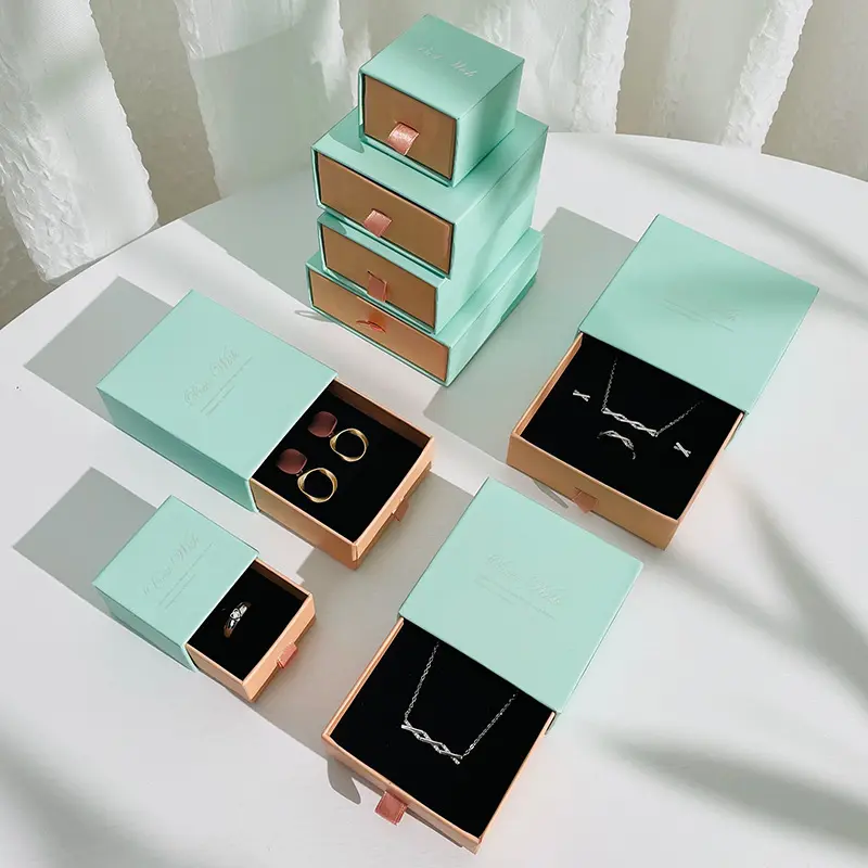 Caja rígida Kraft de alta calidad para cosméticos de aceite de maquillaje, embalaje para enviar por correo con pegatinas, juego de caja de embalaje de papel artístico