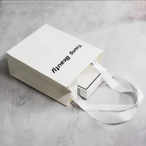 Impresión de bolsa de papel Kraft marrón liso con mango de cuerda trenzada Bolsas de papel personalizadas con su propio logotipo - Product Image 5