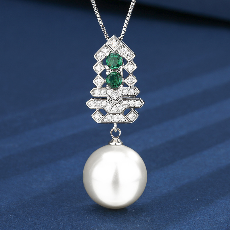 Pendentif perle verte et blanche avec chaîne