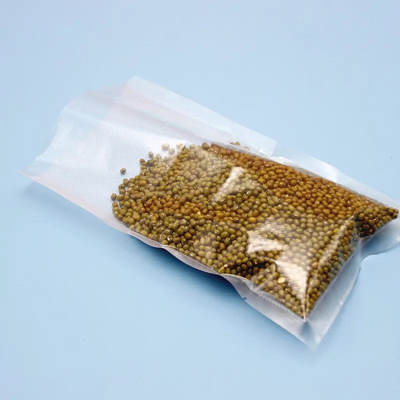 Saco de vácuo para alimentos de tamanho personalizado, saco de plástico transparente para armazenamento a vácuo com vedação térmica de frango congelado em relevo PE