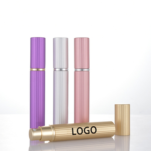 Flacon de parfum vide en aluminium 8 ml à ouverture par pression avec récipient en verre pour parfum - Product Image 1