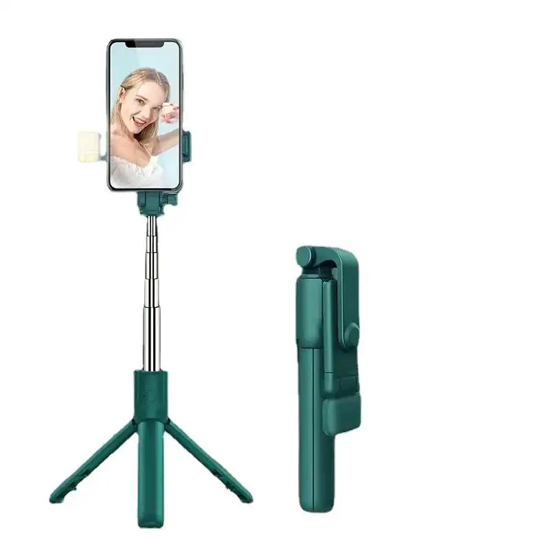 Nuova tendenza telecomando tiro artefatto luce esterna multifunzionale live streaming desktop treppiede Selfie Stick