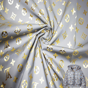 精美闪亮图案滑滑羽绒服装饰金色印花高级面料冬装 - Product Image 5