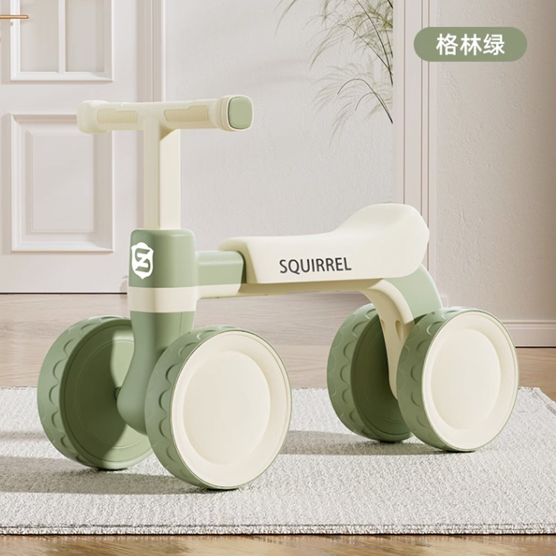 Mini voiture d'équilibre à quatre roues vert vert