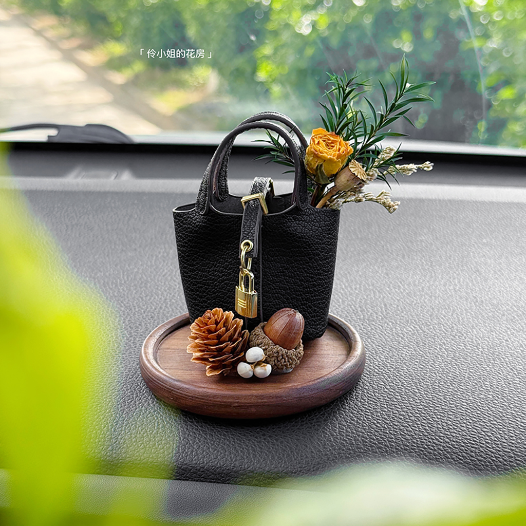 Black handbag + Yellow roses