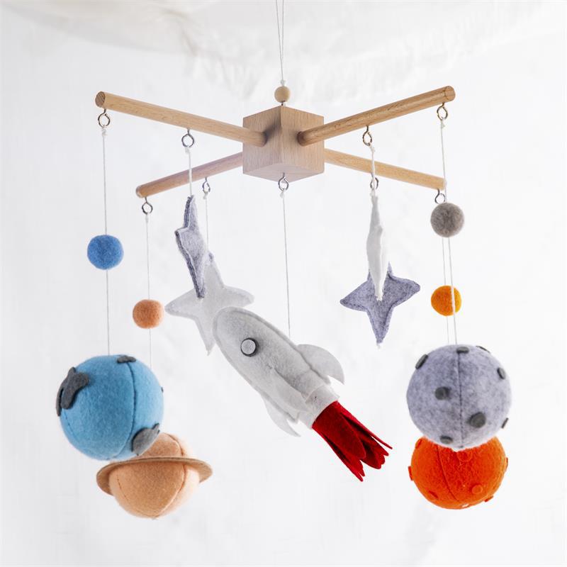 Planet felt bed bell cross