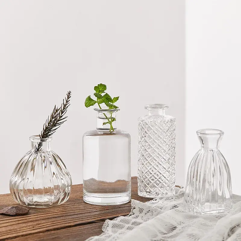 Vendita calda moderno stile minimalismo piccolo ed elegante bocciolo ovale trasparente centrotavola fiori trasparenti vaso di vetro per il matrimonio