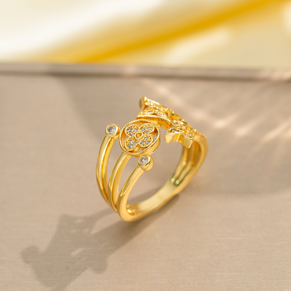J91 Fleur dorée à quatre feuilles