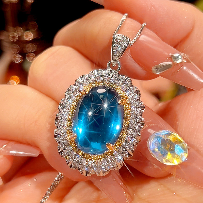 Blue pointed crystal pendant with box chain