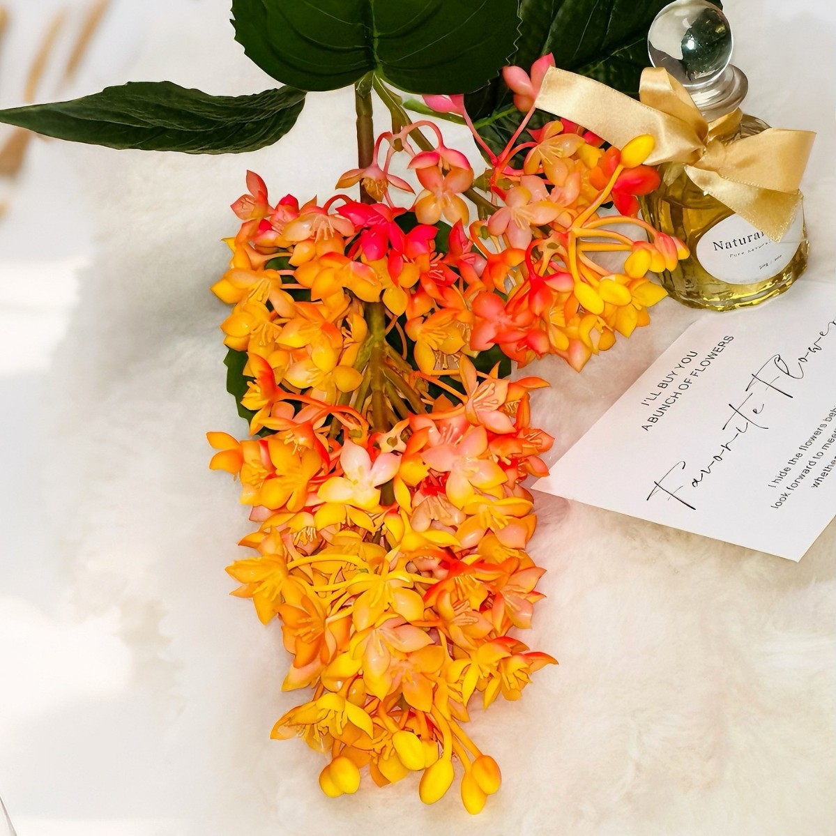 Tangerine-yellow lilac flowers, artificial scene