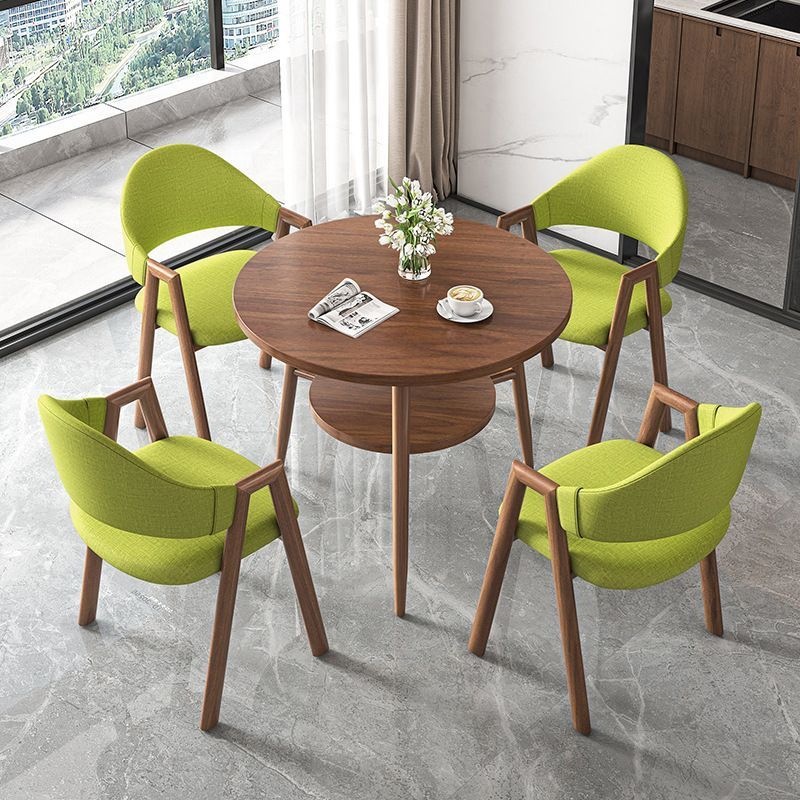 Round table + 4 green fabric chairs-walnut-colored legs