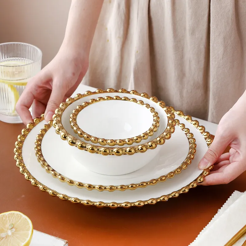Vajilla de cerámica de lujo con borde de perla dorada, juego de cubiertos de hueso real de China para fiesta de boda, regalo para el hogar