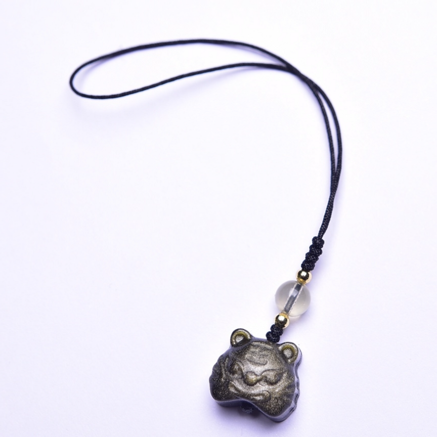 7. Tête de tigre dorée