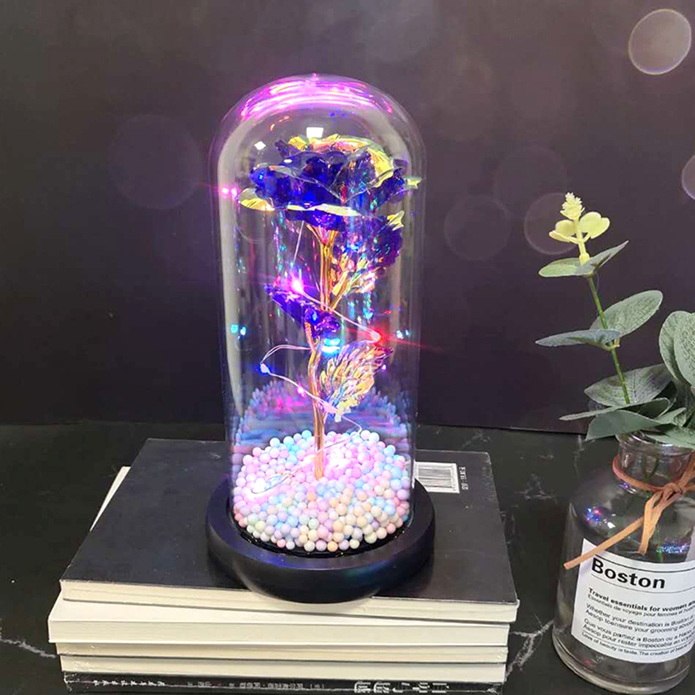 #Caja rosa con cúpula de cristal y 12 lámparas de colores.