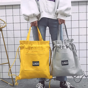 Venta al por mayor de diseño de color sólido reciclado de viaje logotipo personalizado de algodón cuerda de lona con cordón mochila de compras - Product Image 1