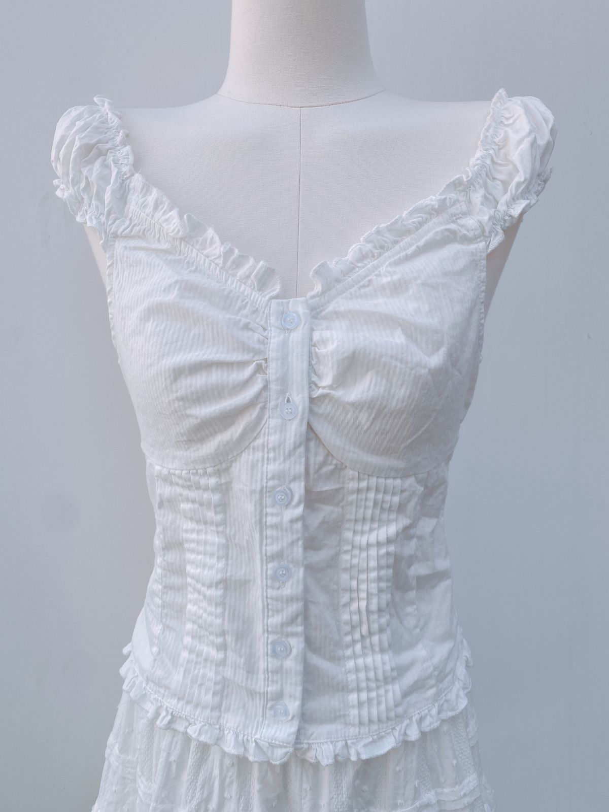 Camicia a maniche corte plissettata a righe bianche