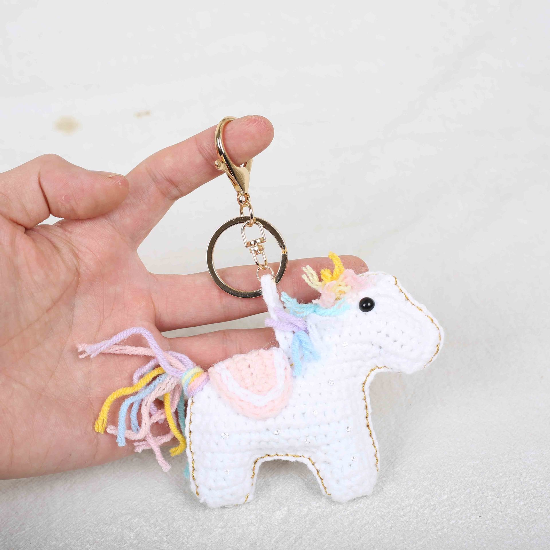 Boucle cheval blanc doré