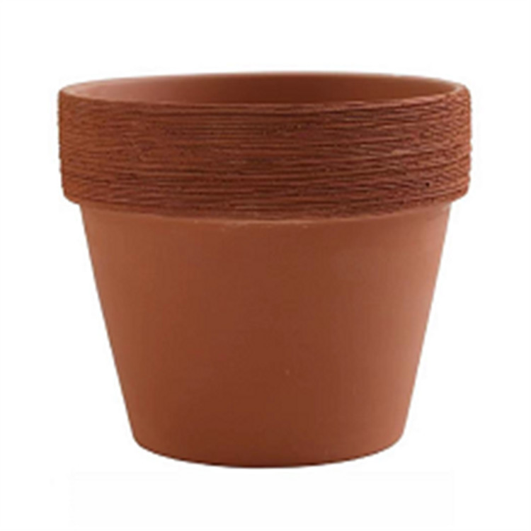 Poterie rouge brossée