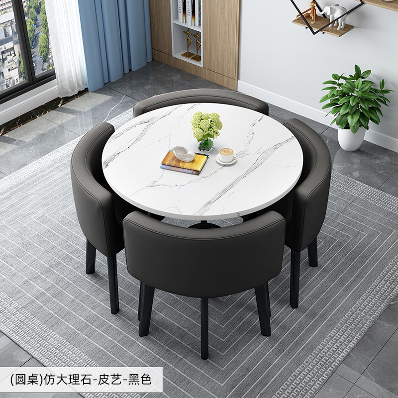 Tavolo rotondo decorato + sedia in pelle nera