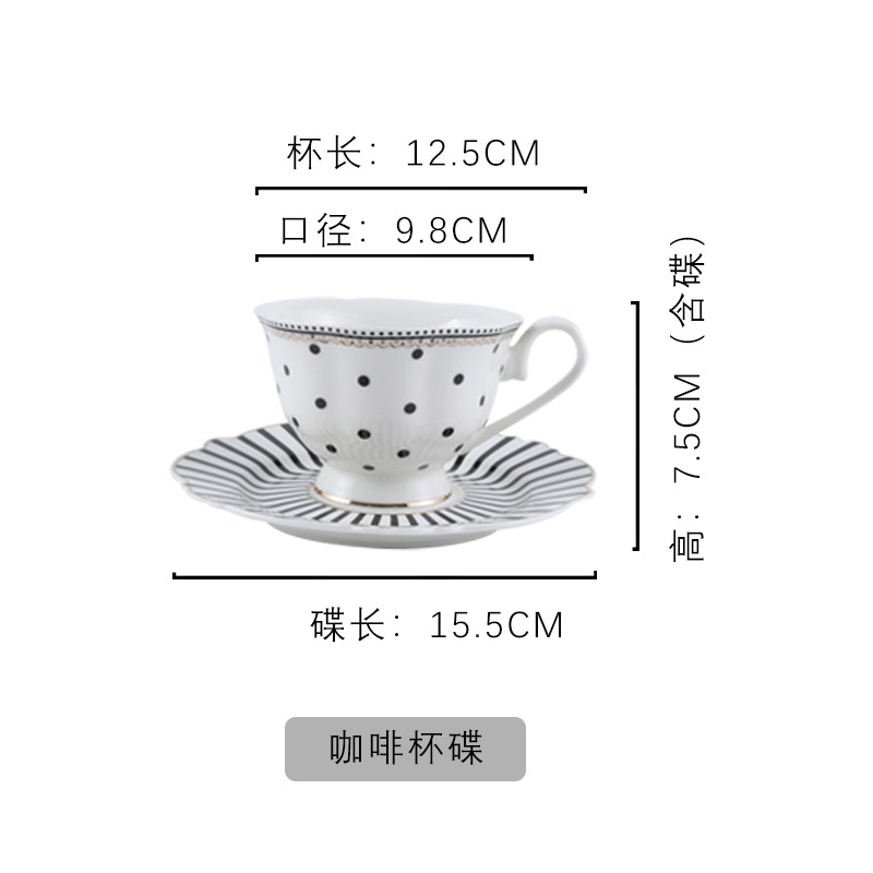 Tasse à café et soucoupe à pois noirs