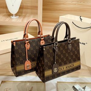 MK กระเป๋าโท้ทความจุขนาดใหญ่แบบใหม่มีดีไซน์เฉพาะกลุ่มและเป็นกระเป๋าถือแฟชั่นระดับไฮเอนด์และหรูหรา - Product Image 1