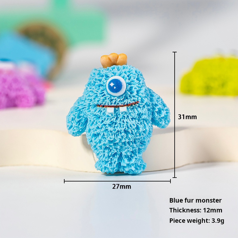 Monstruo de peluche azul.