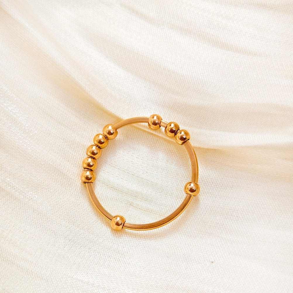 Oro rosa (diez cuentas pueden girar)