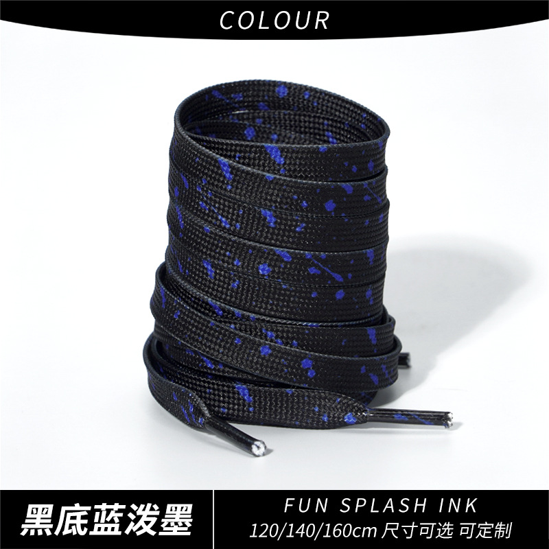 Black background with blue splatter ink