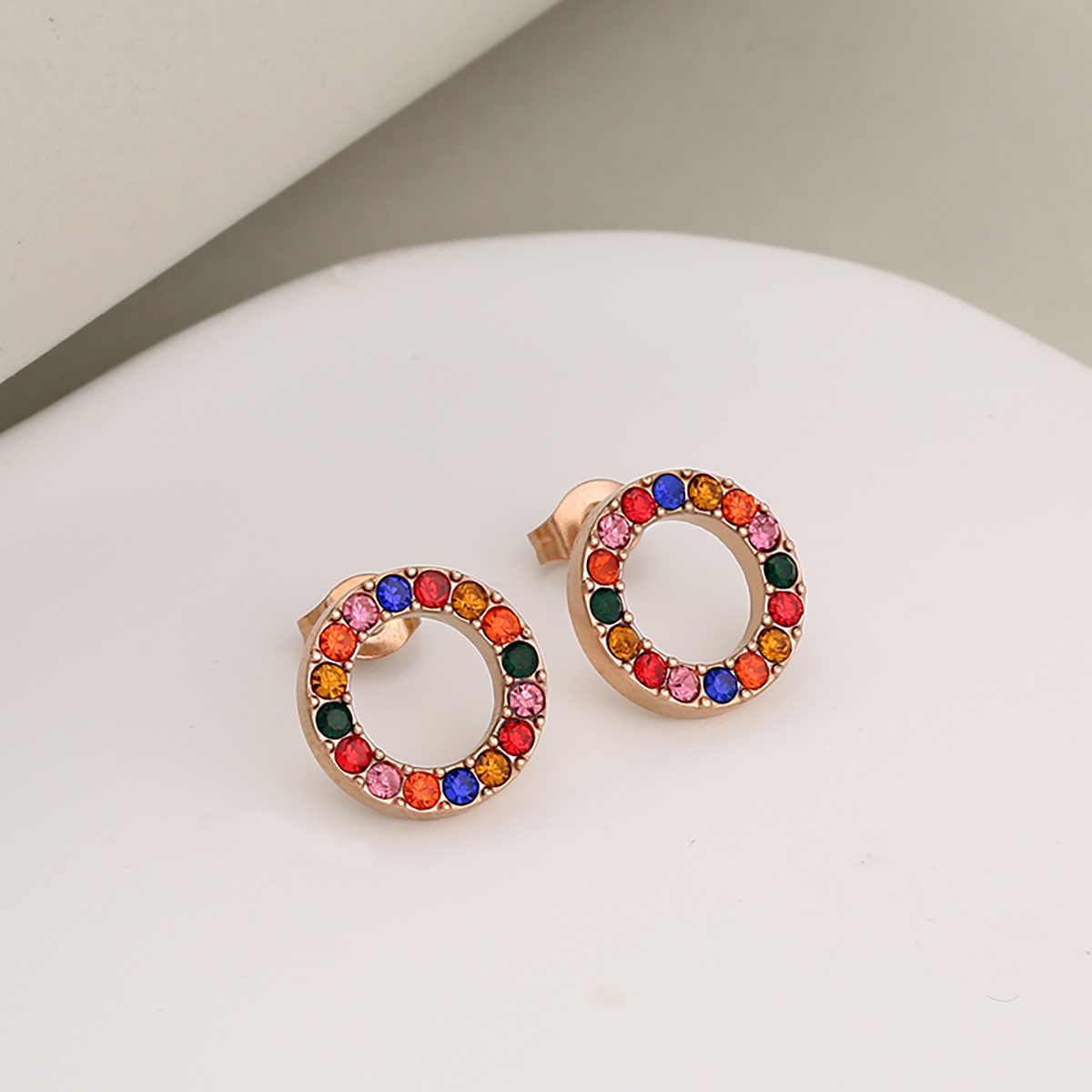 Rose gold and colored rhinestone earrings