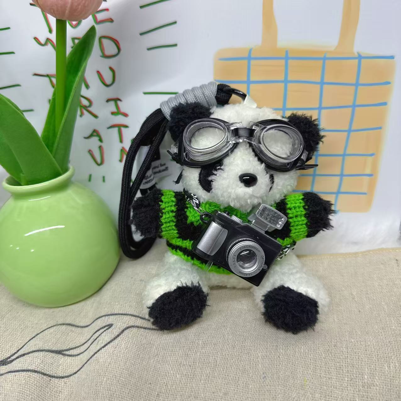 Camera panda black green stripe sweater
