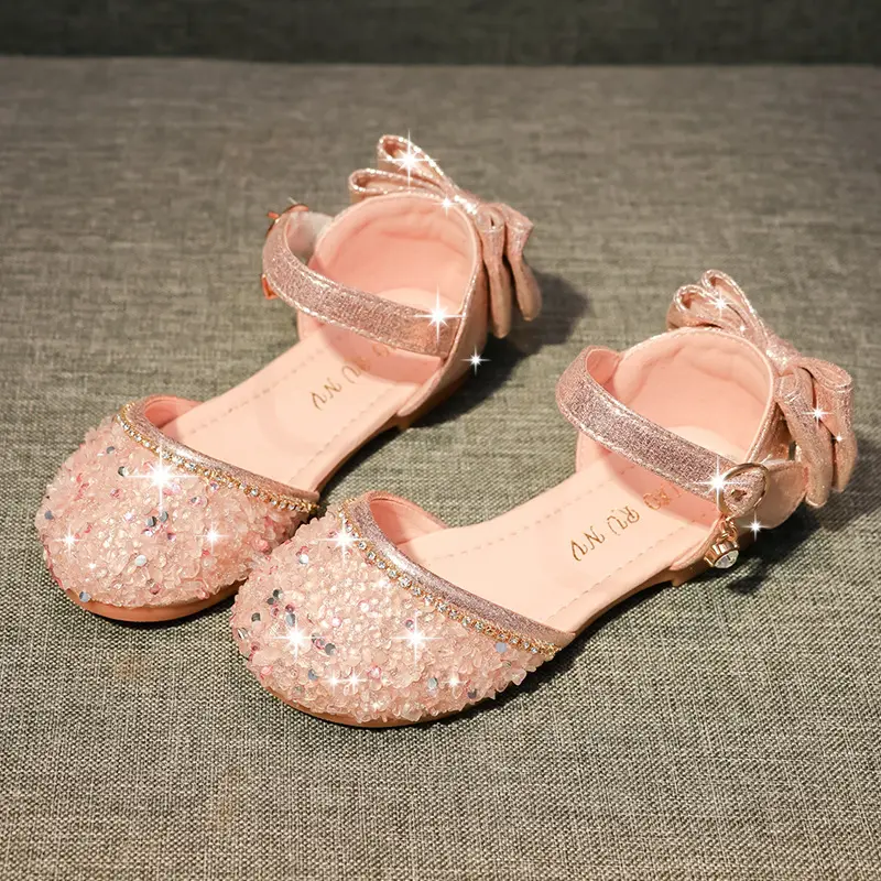 Sandali eleganti da ragazza estivi scarpe in pelle Pu Bowknot Design suola piatta sandalo con paillettes per bambini ragazze