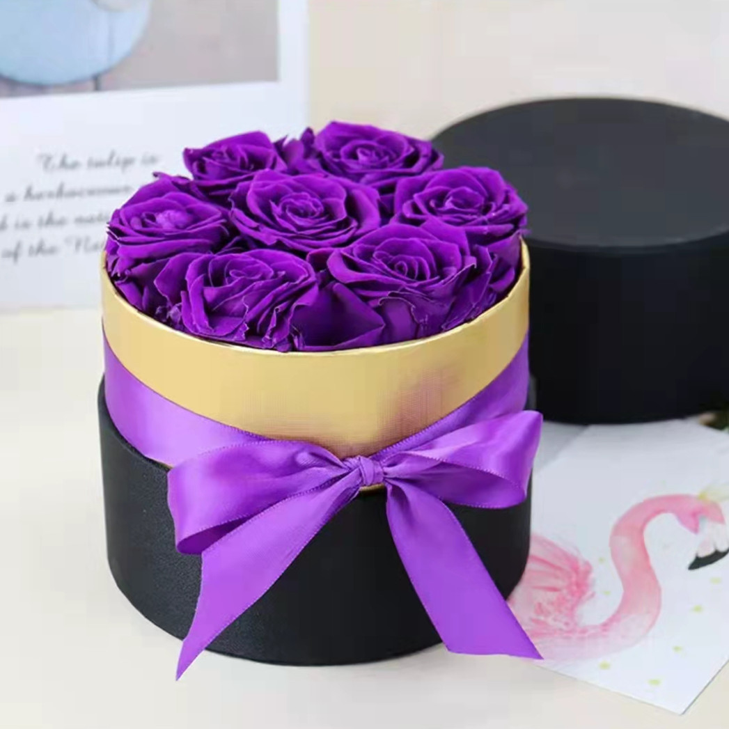 7 roses en boîte ronde