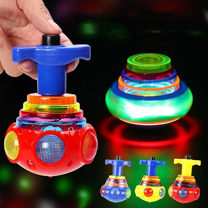 ขายร้อนการ์ตูนไฟฟ้าไฟ LED ขึ้นไจโรสโคปกระพริบดนตรี Spinning Tops พร้อมไฟและดนตรี