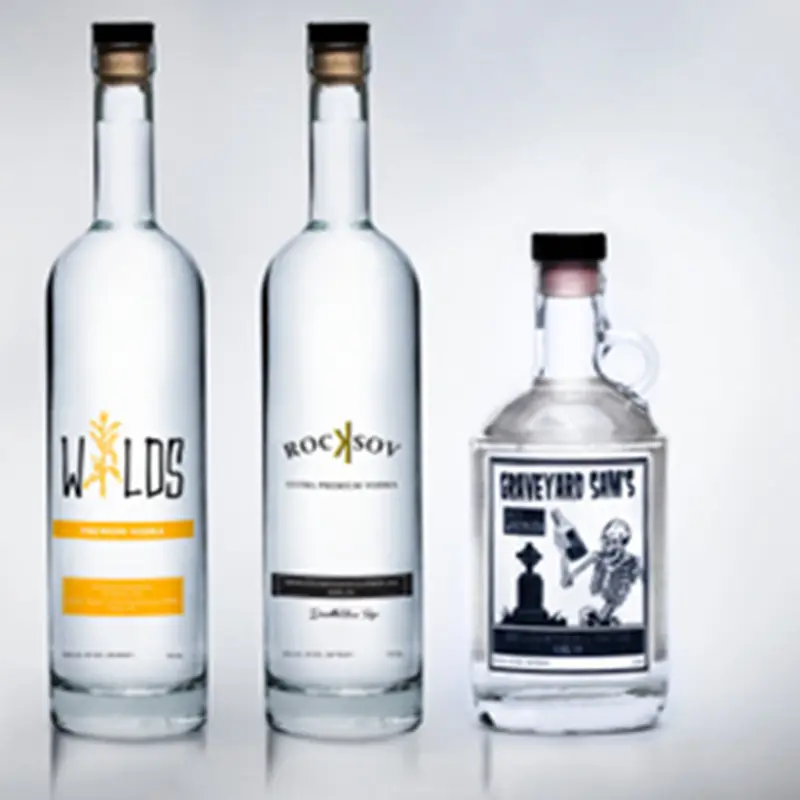 Benutzerdefinierte Super Flint luxus zylinder Form Kork Top Wodka Gin geist leere klar 500ml 1Liter glas flaschen hersteller verkauf