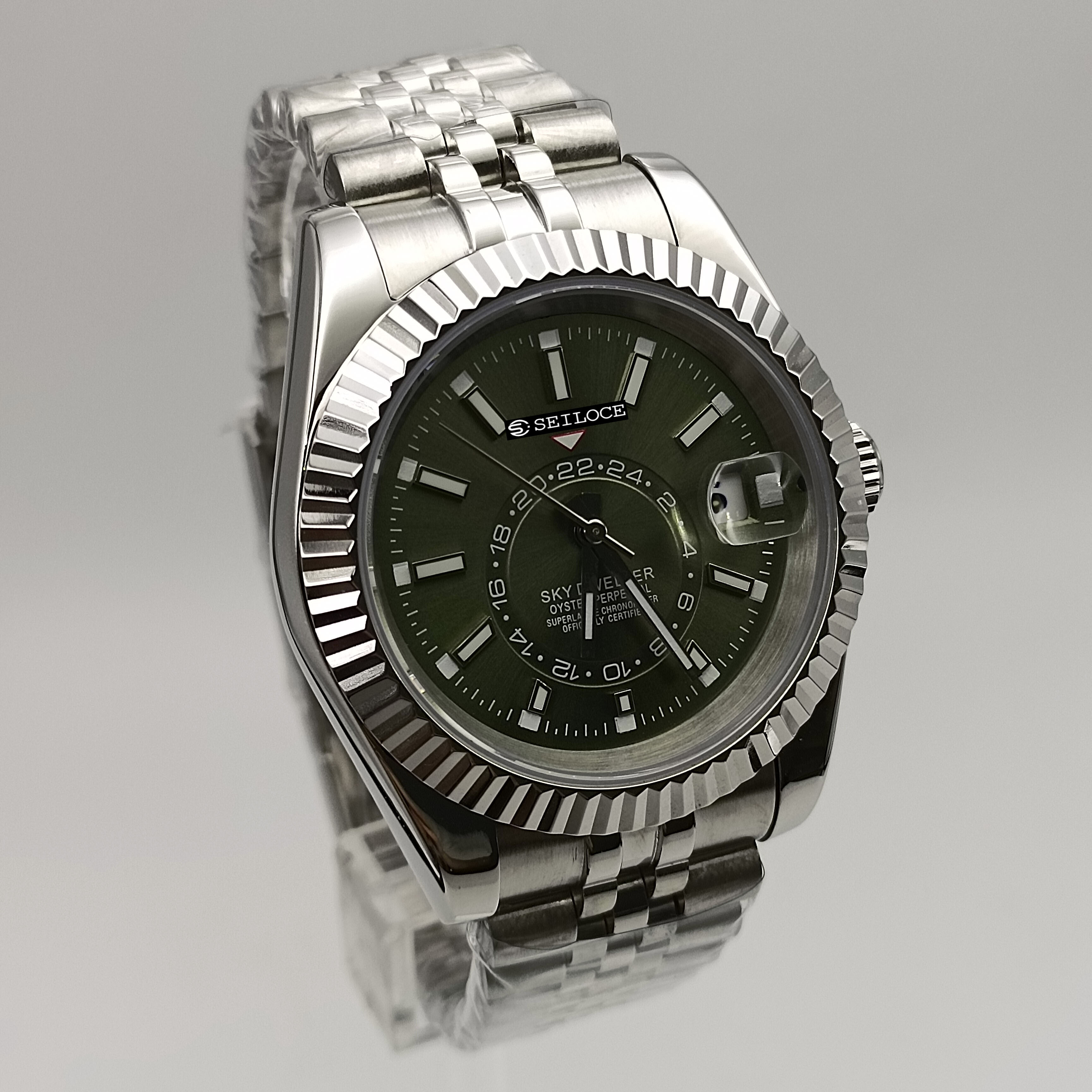 Caja plateada+esfera verde