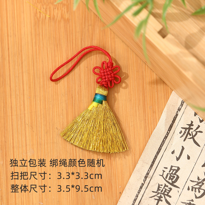 Pendentif balai doré noeud chinois