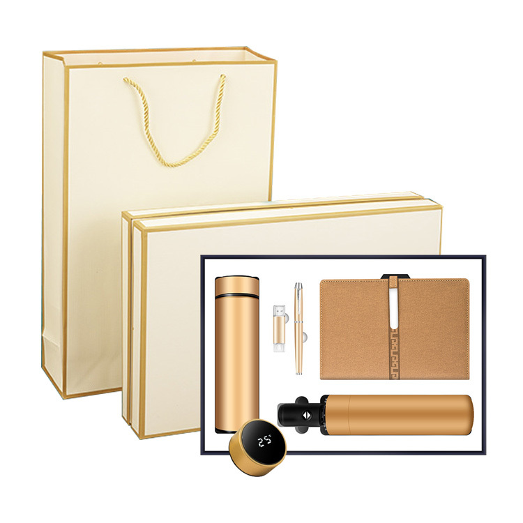 Or (5 pièces : cahier + stylo + thermos + parapluie + clé USB)