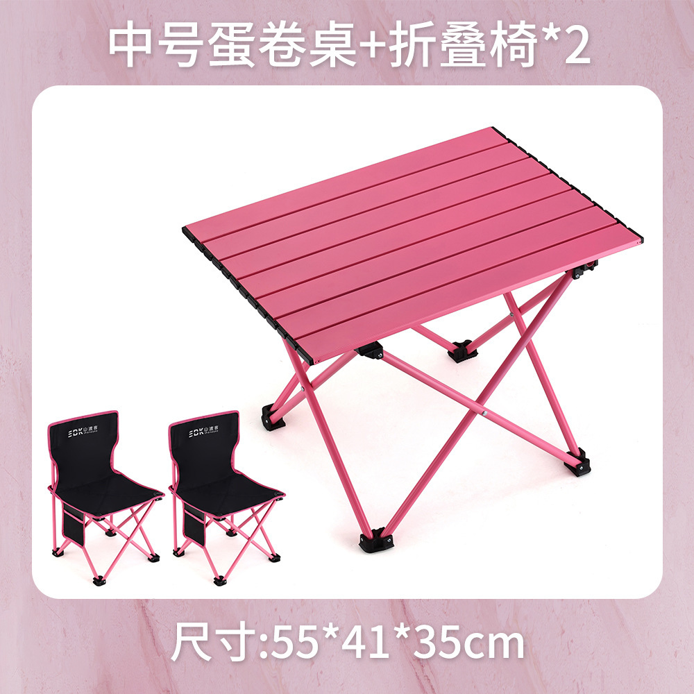 Medium-sized pink table and black/pink folding chairs (2 pieces)