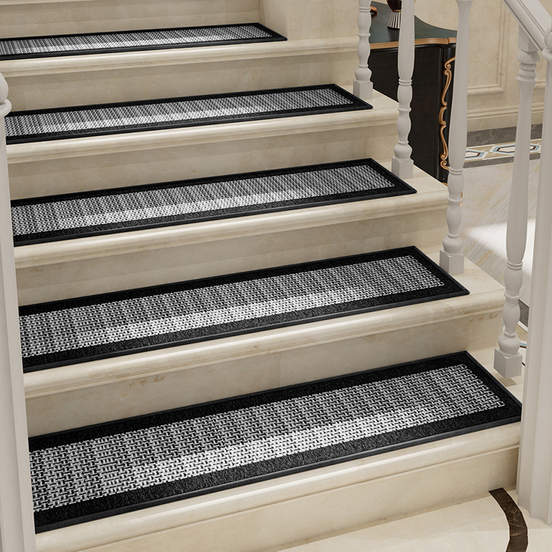 Alfombra de escalera con fondo de goma Dornier - tejida en negro